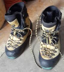 Damaged Trekking shoe repairing by machinr